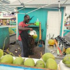 Freeport, Bahamas enterprising coconut drink salesman
