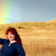 Kirkjubæjarklaustur rainbow - Just outside our bedroom door! It disappeared and reappeared about 6 times.