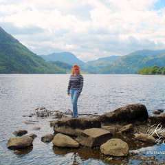 Lake District, England - Only moments ago she arose from the water with her mermaid tail gleaming. Where did she get those jeans