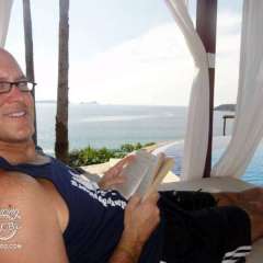 Tom relaxing by the pool