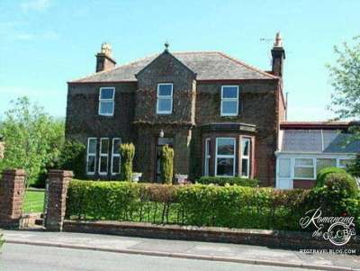 Beautiful Knowefield, in Lockerbie, Scotland with glorious gardens out back and charm throughout